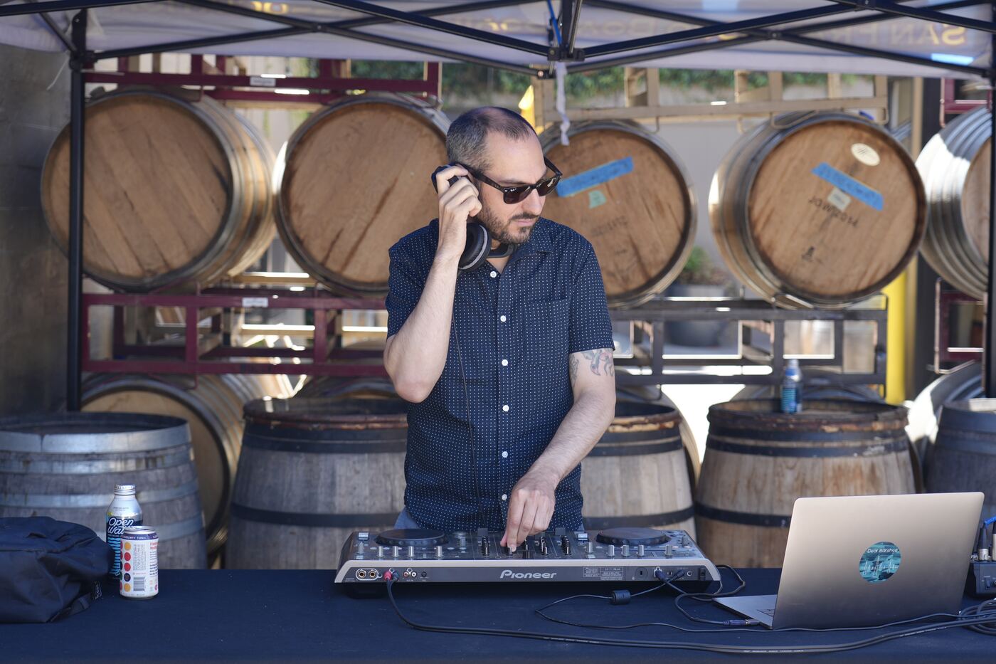 DJ set among the barrels