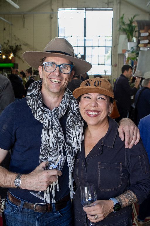 Two guests in hats