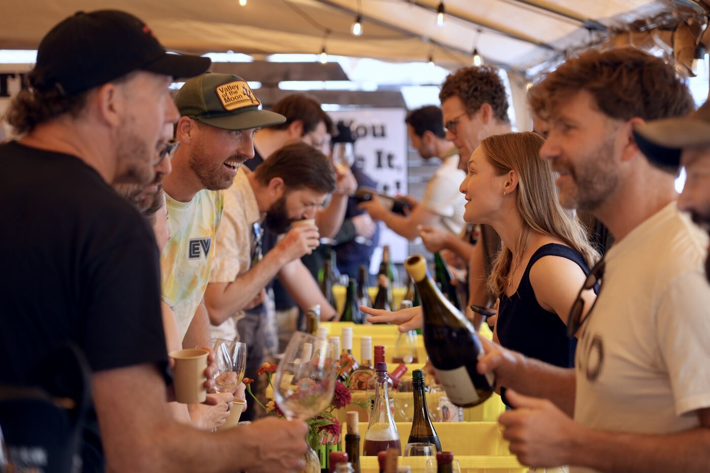 Crowd around a pouring table