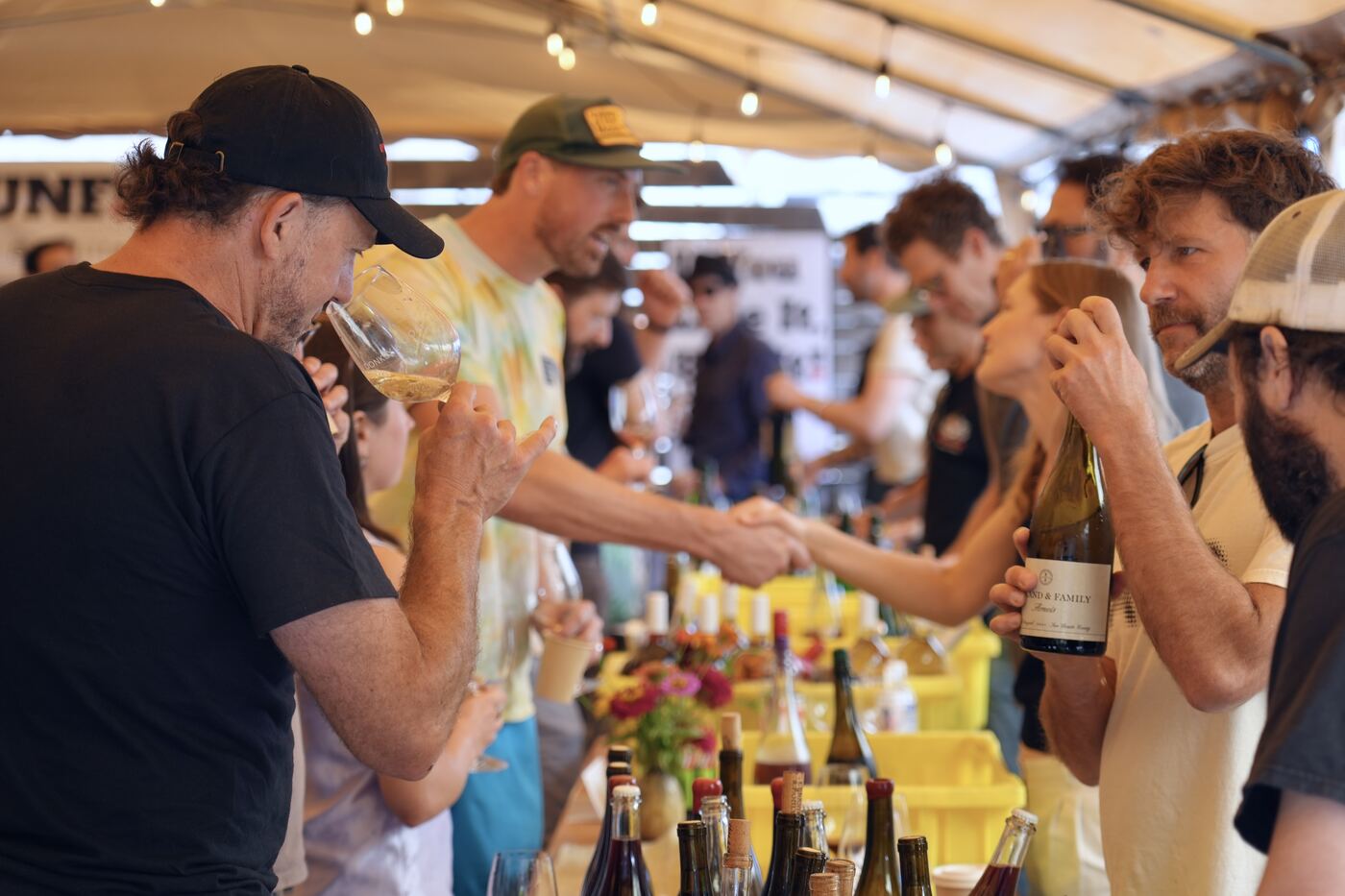 Handshakes across the pouring table