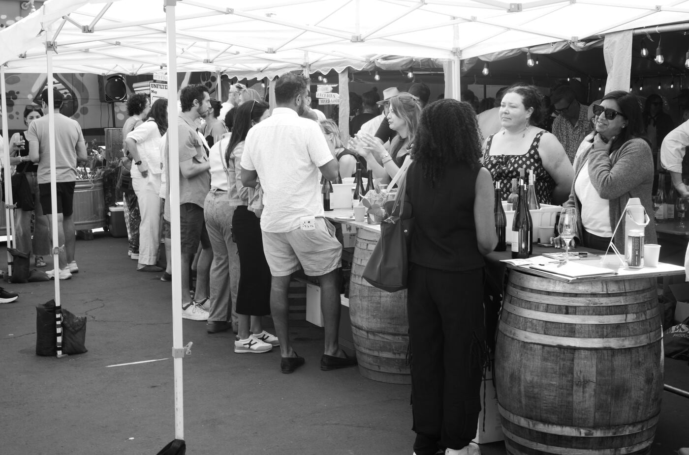 Black and white: guests at the outdoor pouring tables