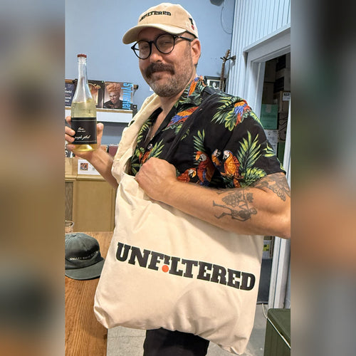 UNFILTERED tote, natural canvas with the black wordmark